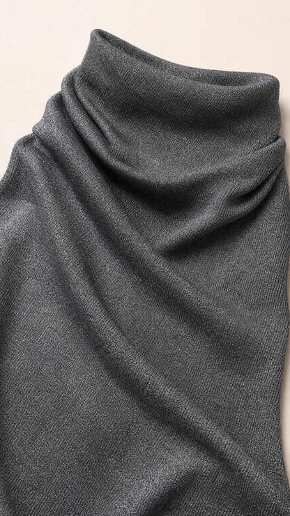 Close-up detail of charcoal textured shimmer stretch fabric