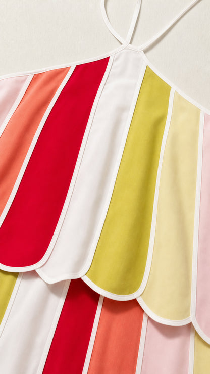 Close-up detail of scalloped hem with white contrast piping