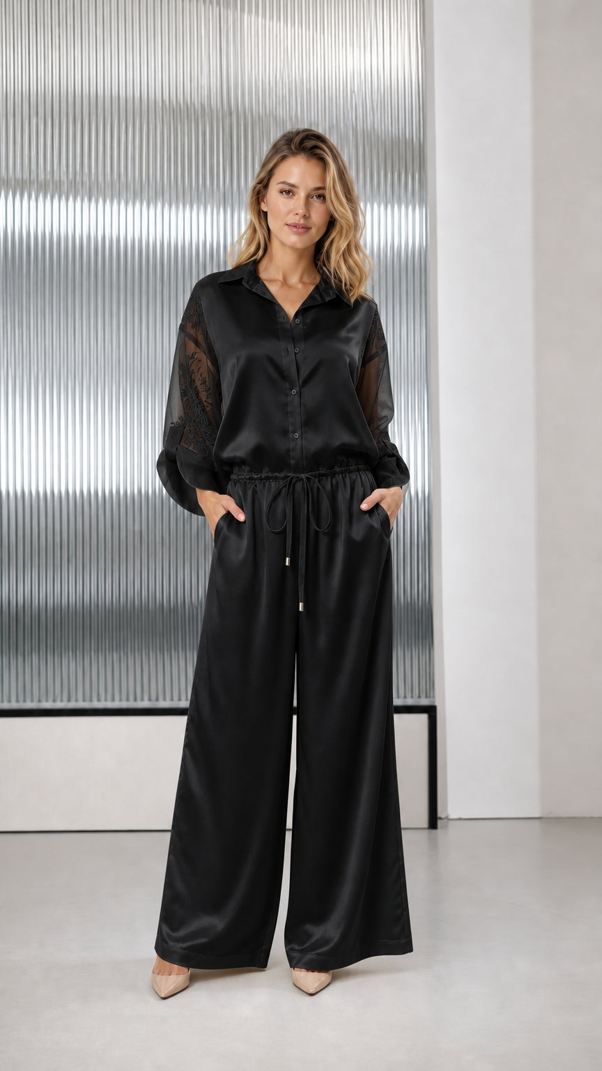 Black satin button-down wide-leg jumpsuit with embroidered long sleeves