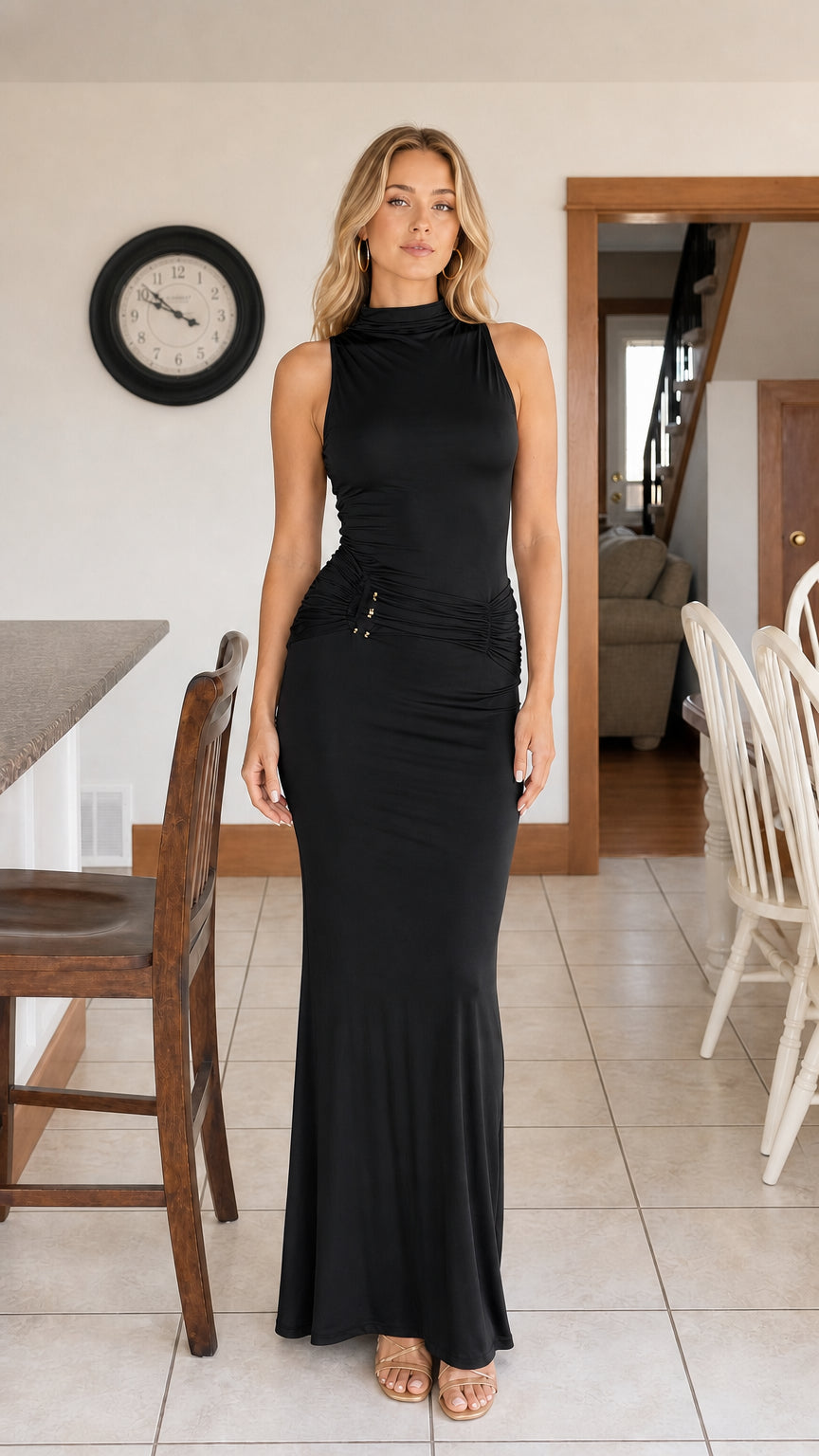 Front full-length view of woman wearing black sleeveless mock neck maxi dress