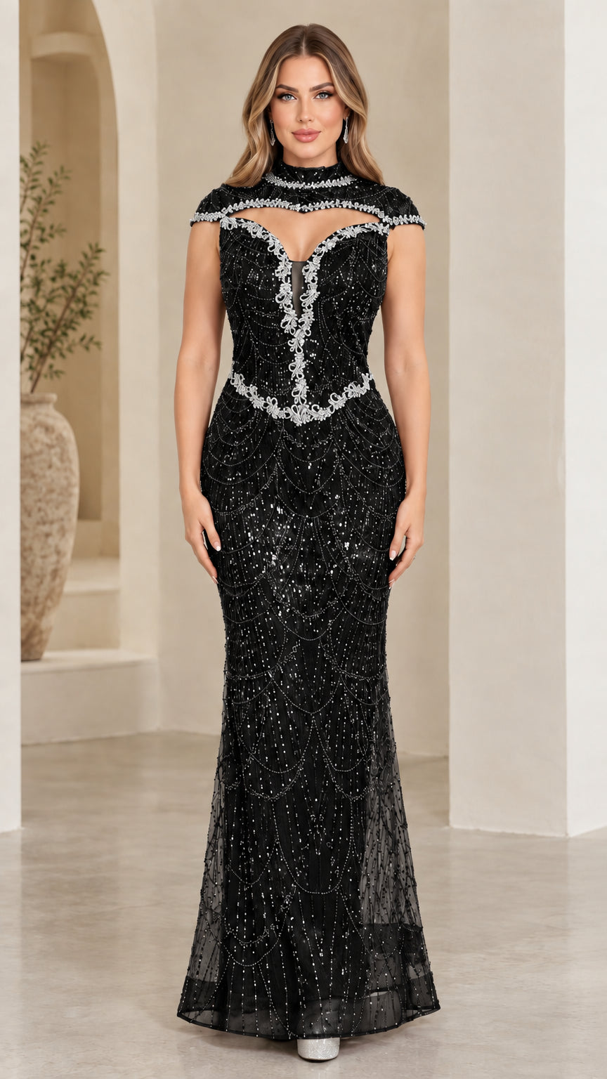 Black beaded and sequined keyhole mermaid evening gown on model
