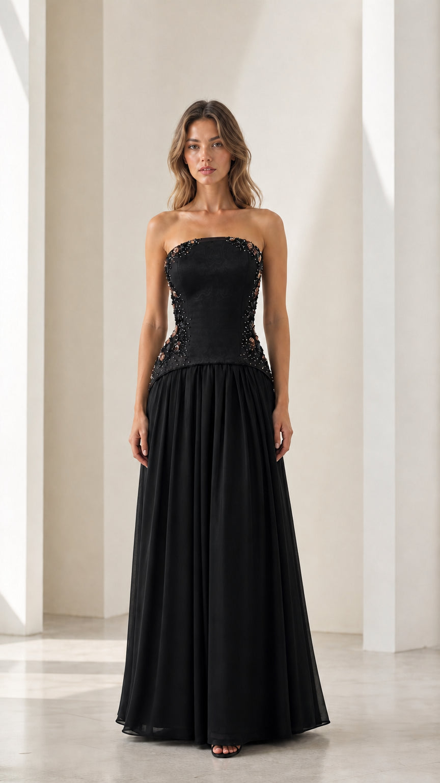 Front full view of black strapless beaded basque waist formal dress