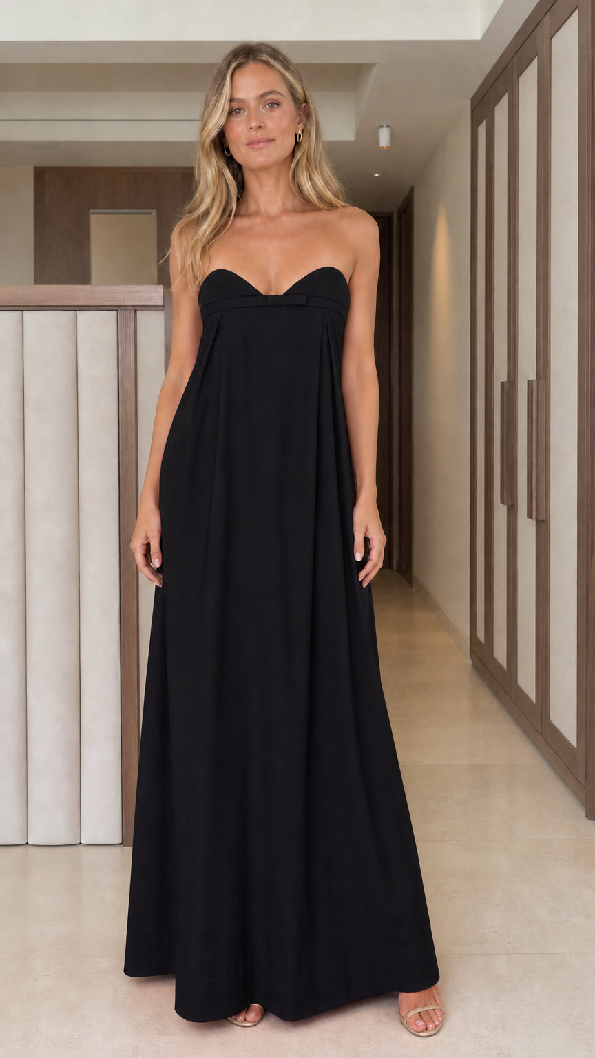 Front full view of classic black strapless bow detail maxi dress