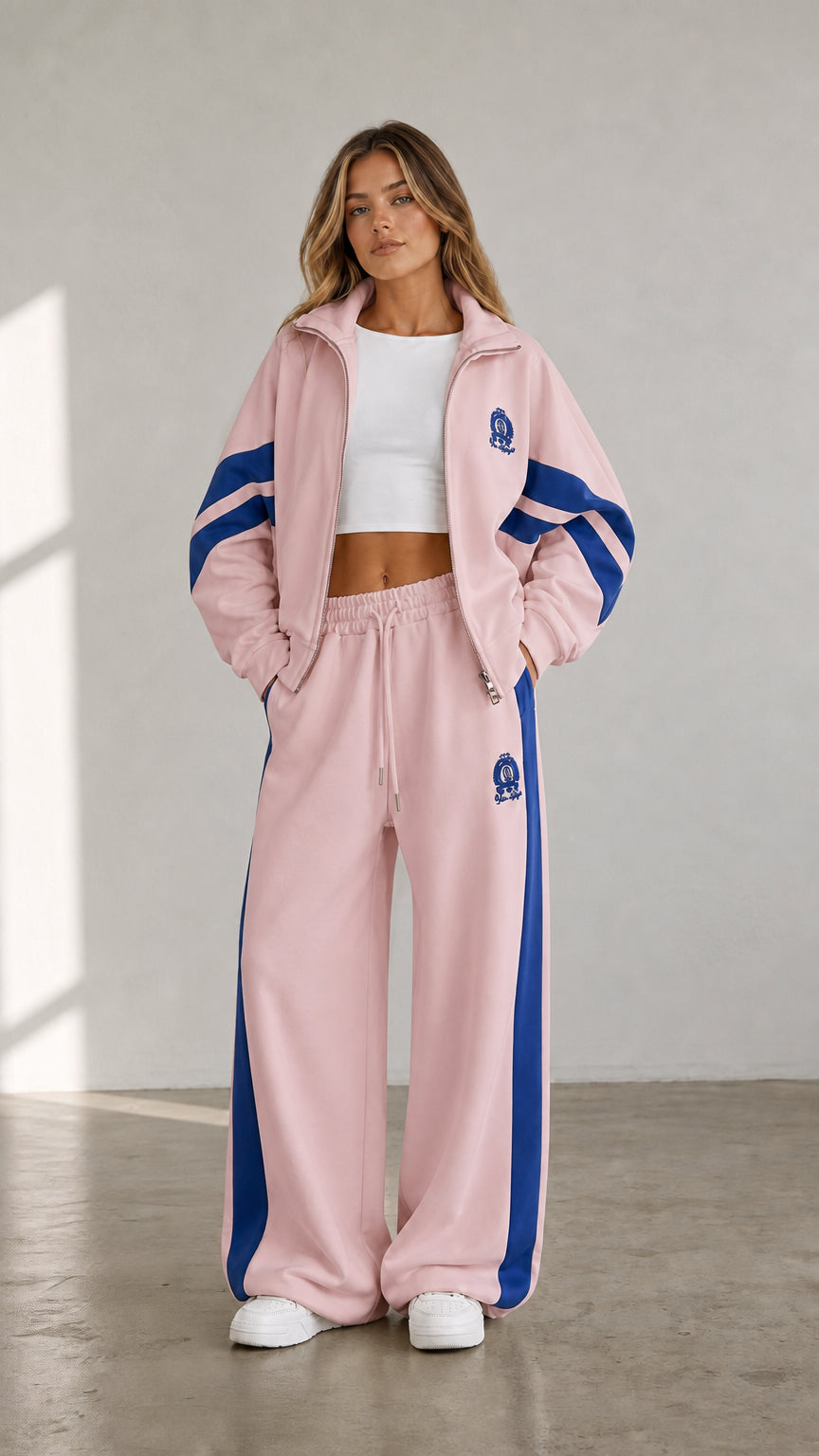 Light pink women's two-piece tracksuit set with blue contrast stripe details
