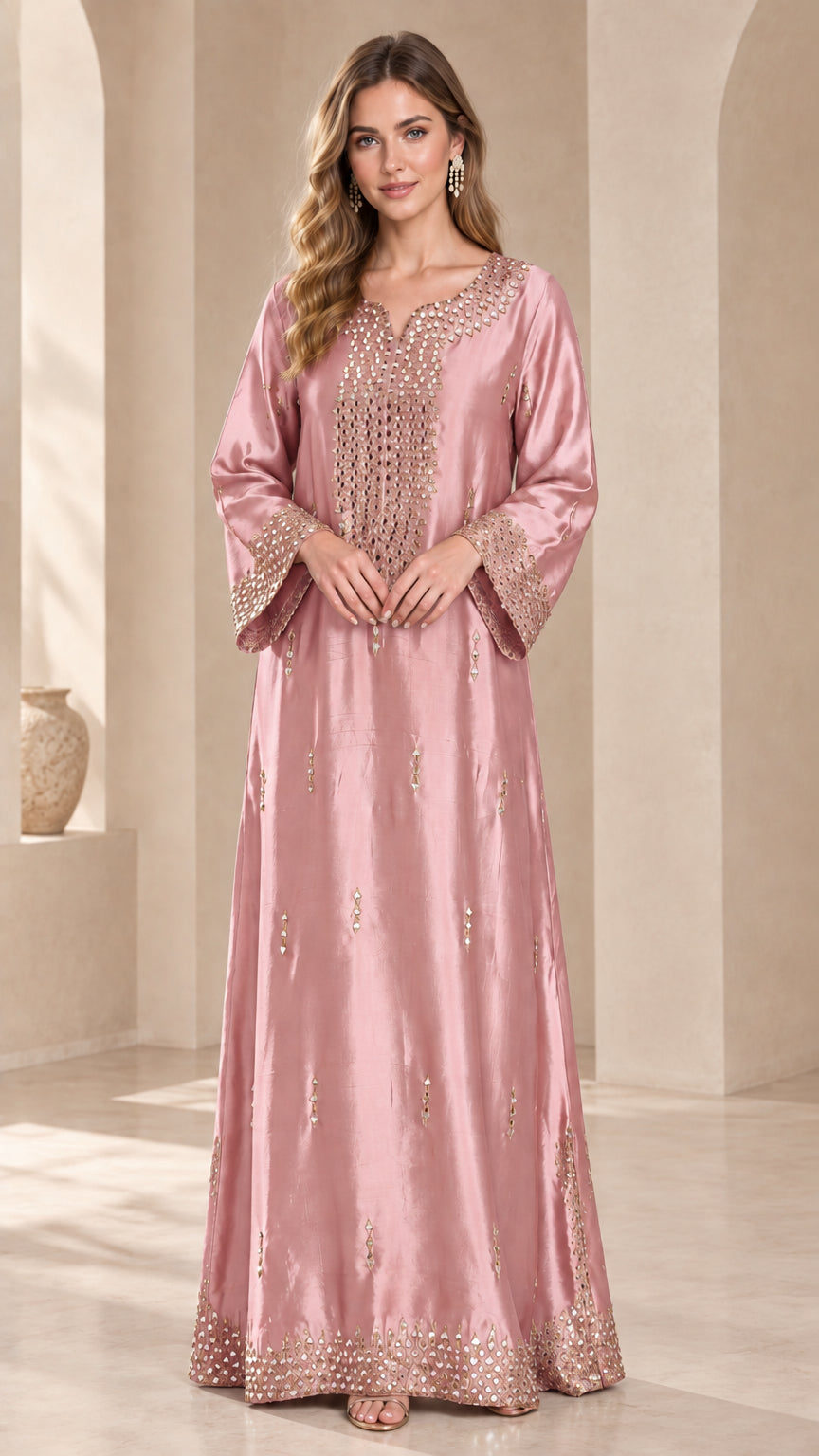Model wearing a dusty pink beaded satin kaftan maxi dress