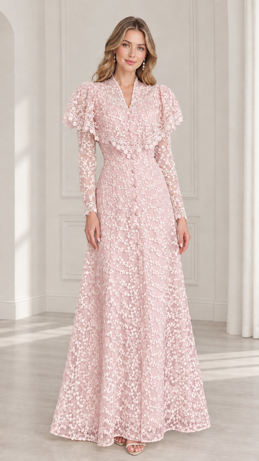 Blush pink lace A-line maxi gown with capelet sleeve overlay