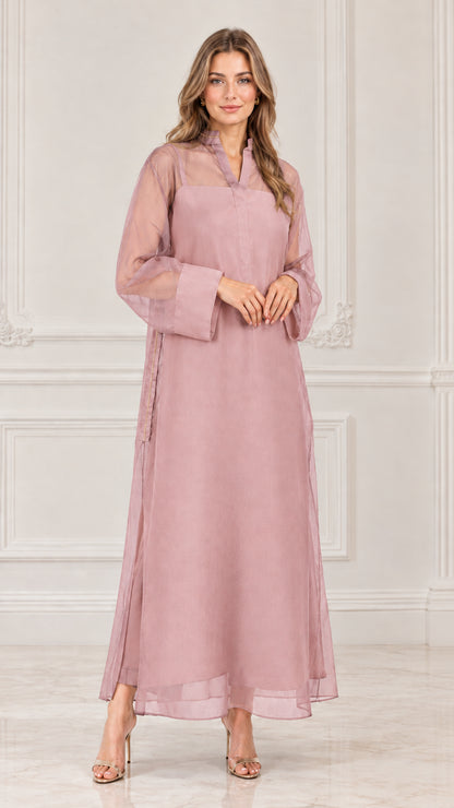 Model wearing dusty pink sheer overlay long sleeve maxi dress