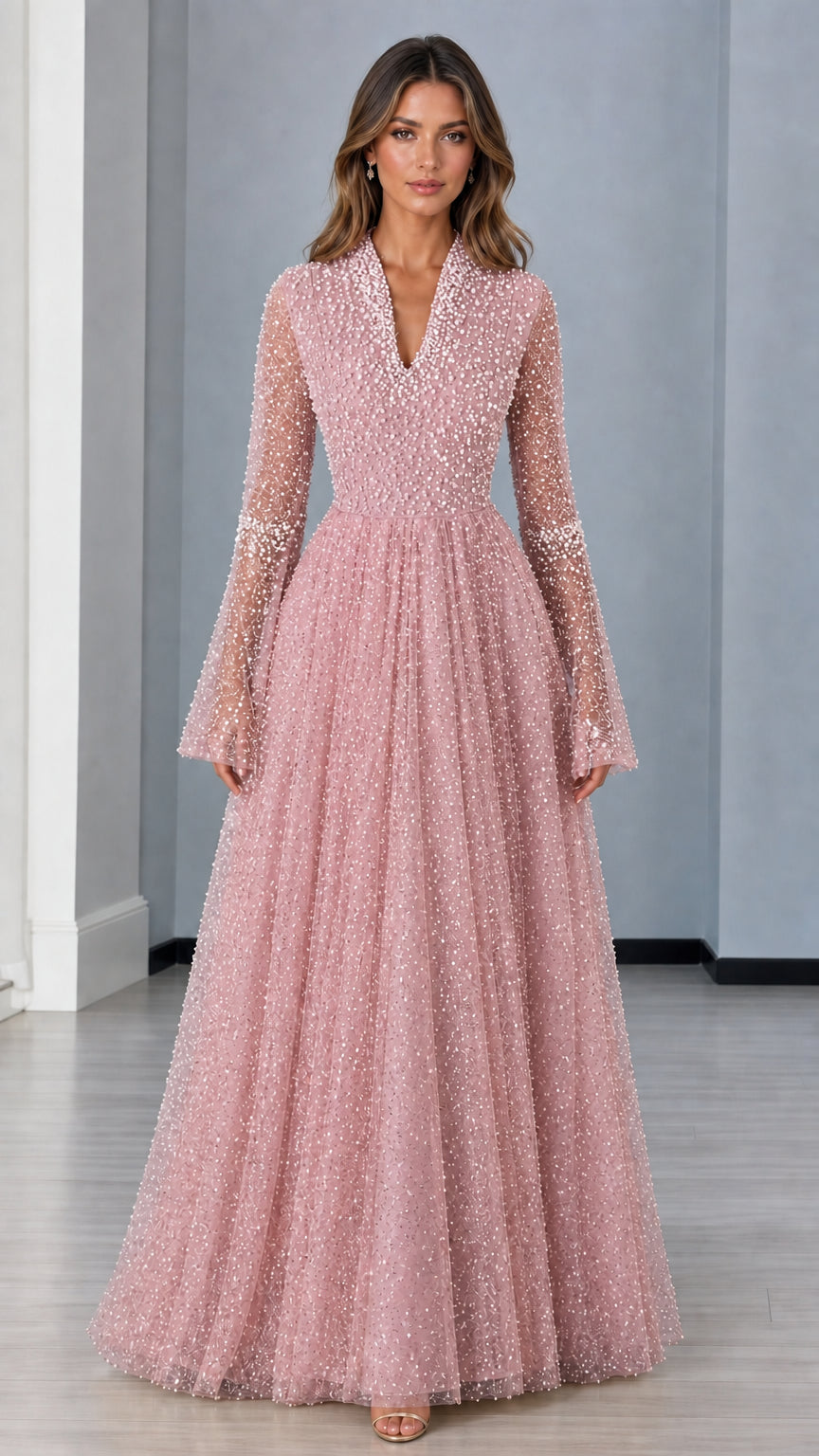 Front view of blush pink pearl-embellished A-line formal maxi dress
