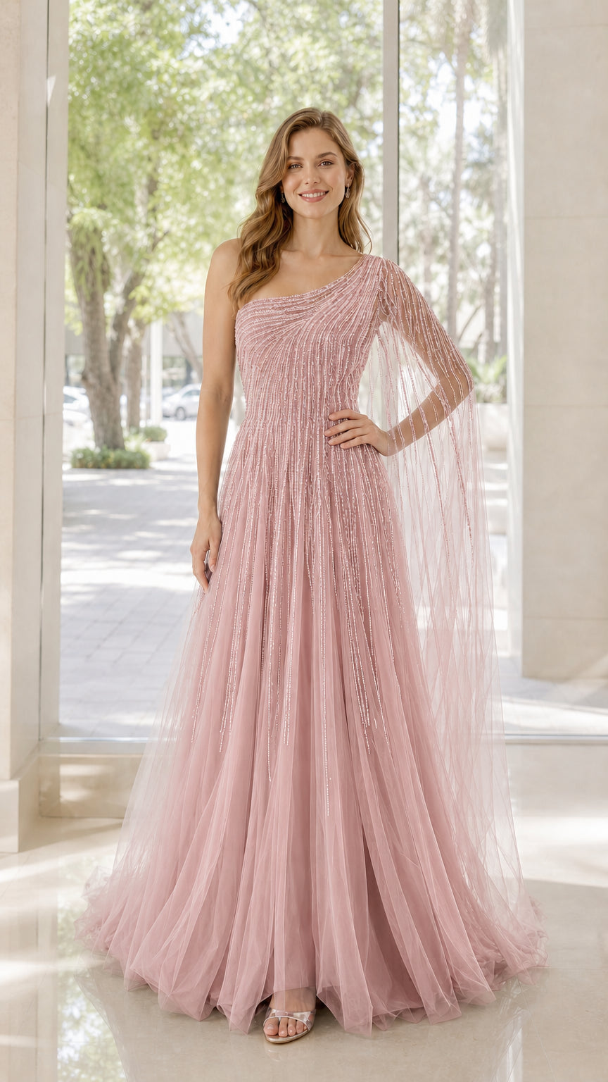 Front view of model wearing pink one-shoulder beaded tulle evening dress