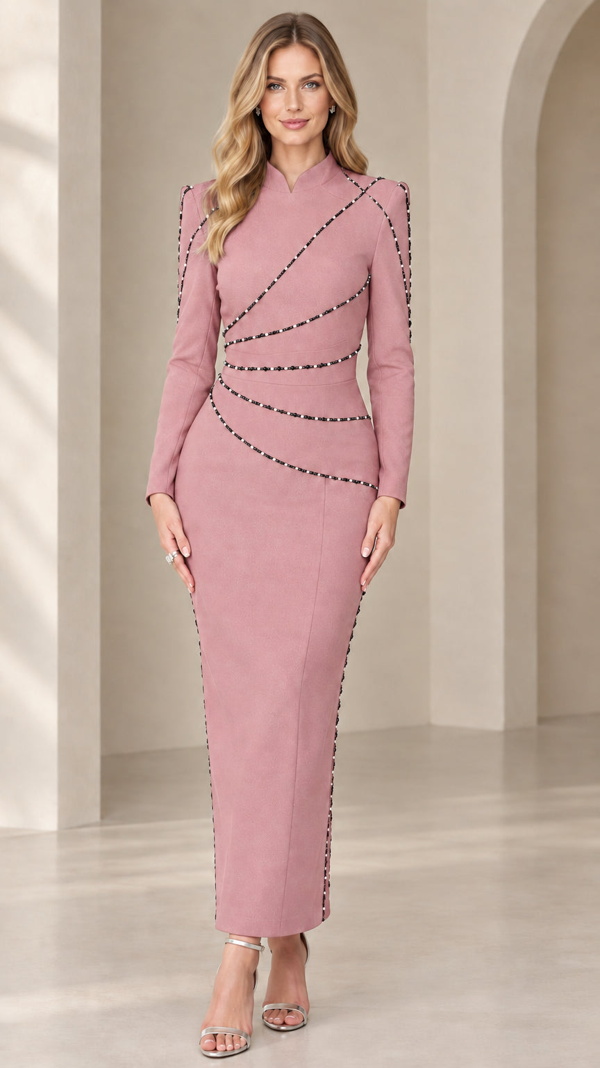 Front view of model wearing dusty pink long sleeve beaded column evening dress