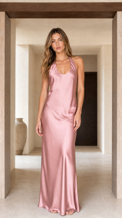Front view of blush pink halter neck backless satin evening dress