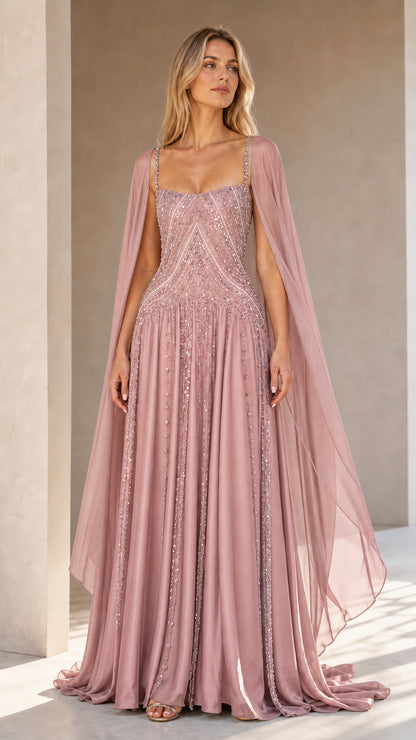 Front view of blush pink sequin beaded formal cape gown