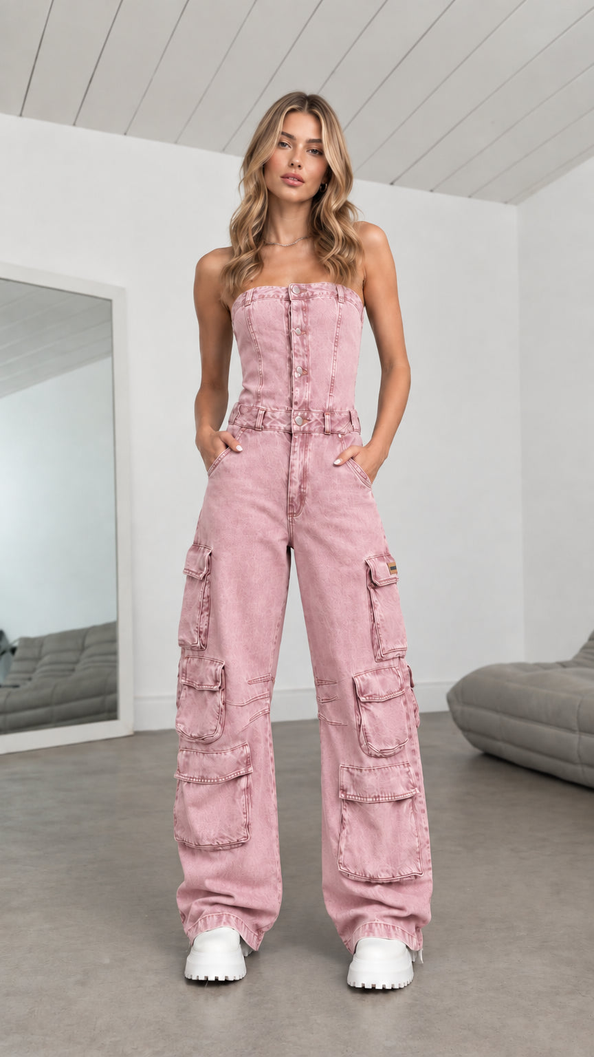 Model wearing Dusty Pink strapless denim cargo wide leg jumpsuit