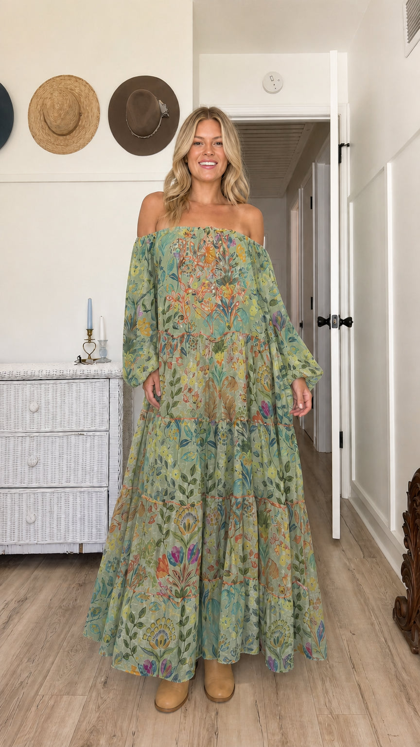 Model wearing sage green floral off-the-shoulder tiered maxi dress