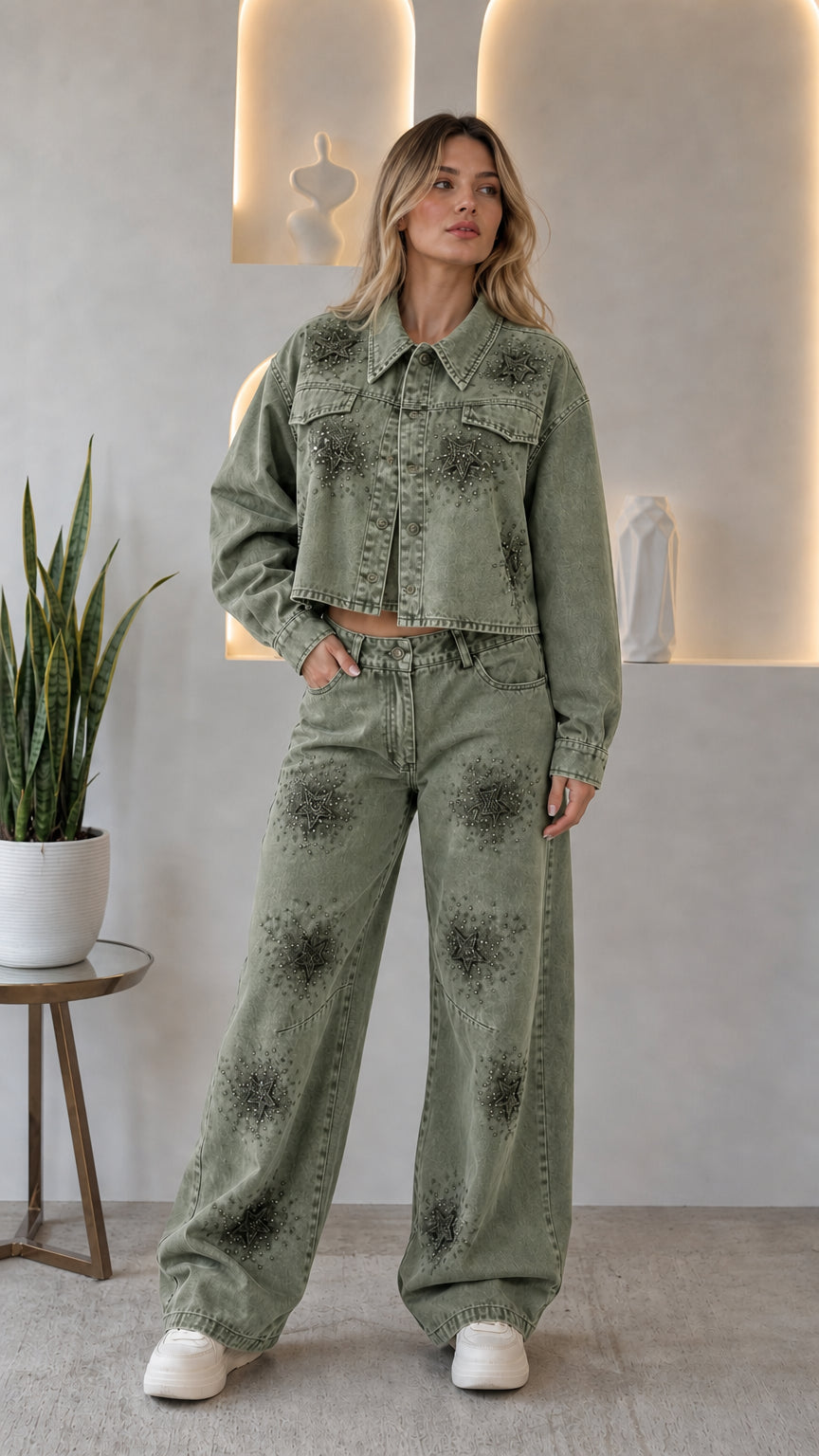 Woman wearing sage green rhinestone star cropped denim jacket and wide leg jeans two-piece set