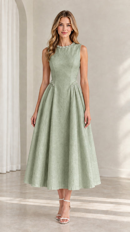 Model wearing sage green sleeveless beaded midi evening dress