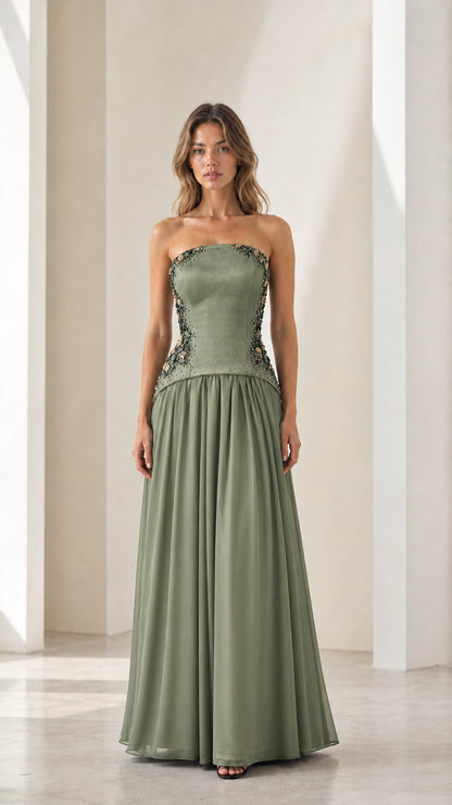 Front full view of sage green strapless beaded formal gown