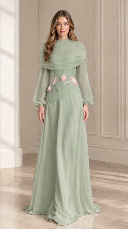 Front view of sage green elegant maxi dress with sheer sleeves and floral waist detail