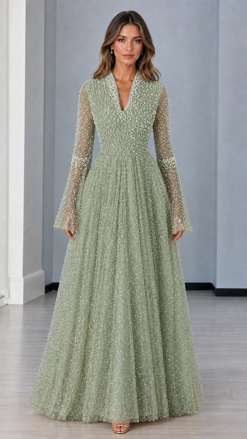 Front view of sage green pearl-beaded long sleeve evening gown