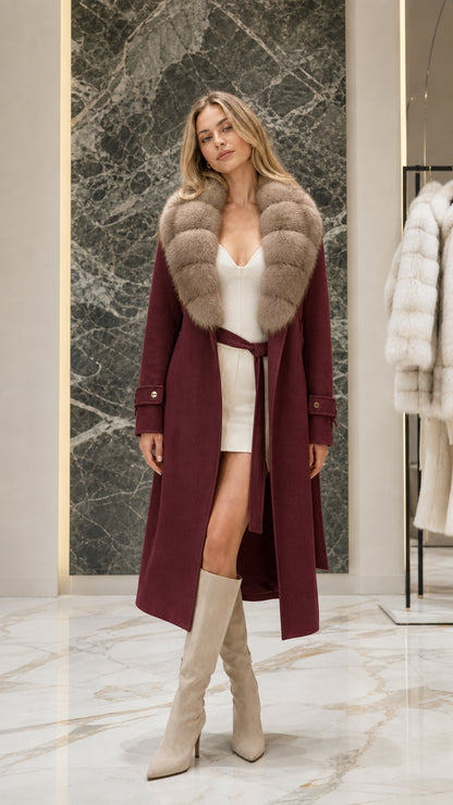 Full front view of rich burgundy wine longline coat with faux fur collar