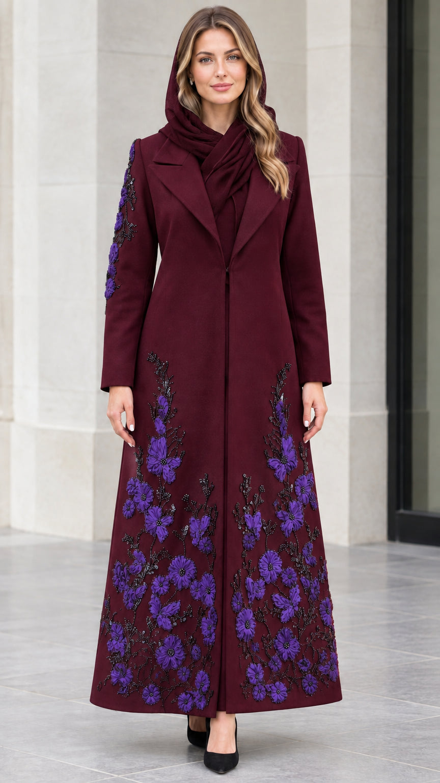 Burgundy full-length coat styled with purple floral embellishments