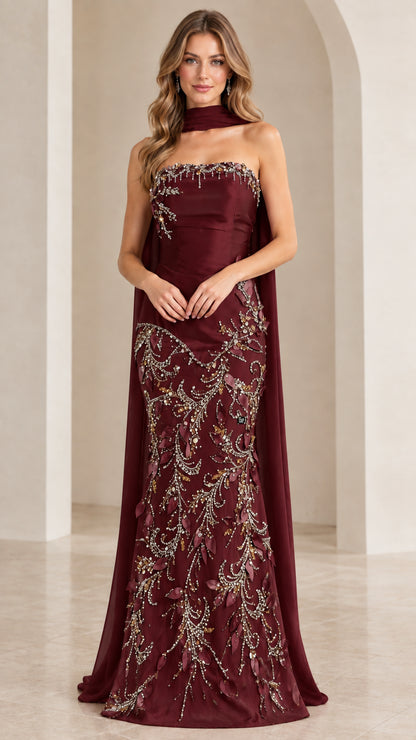 Full-length front view of strapless embroidered mermaid gown in rich burgundy