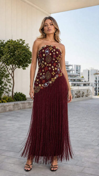 Front view of burgundy wine red strapless beaded fringe evening gown