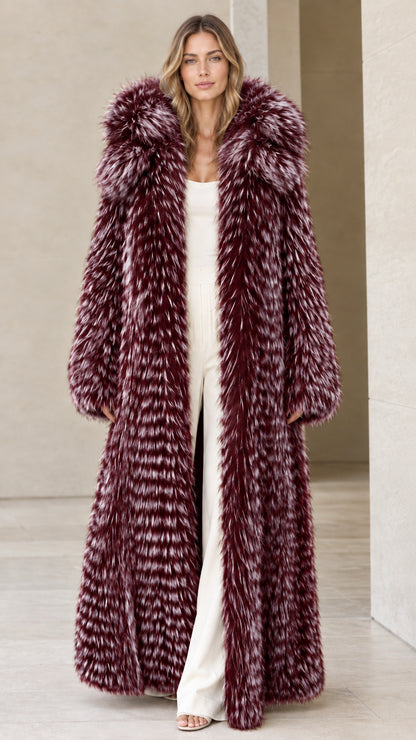 Front view of woman wearing burgundy wine full-length hooded faux fur coat