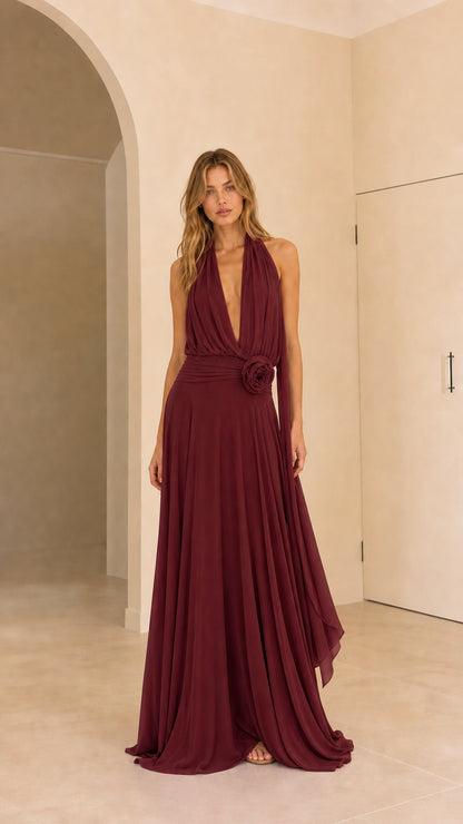 Full front view of burgundy wine red halter neck pleated formal maxi dress