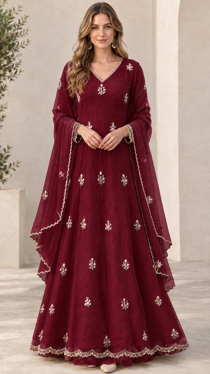 Front view of model wearing burgundy wine embroidered long sleeve dress