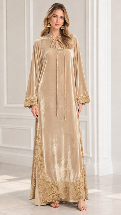 Full front view of model wearing Champagne Gold embroidered velvet kaftan dress