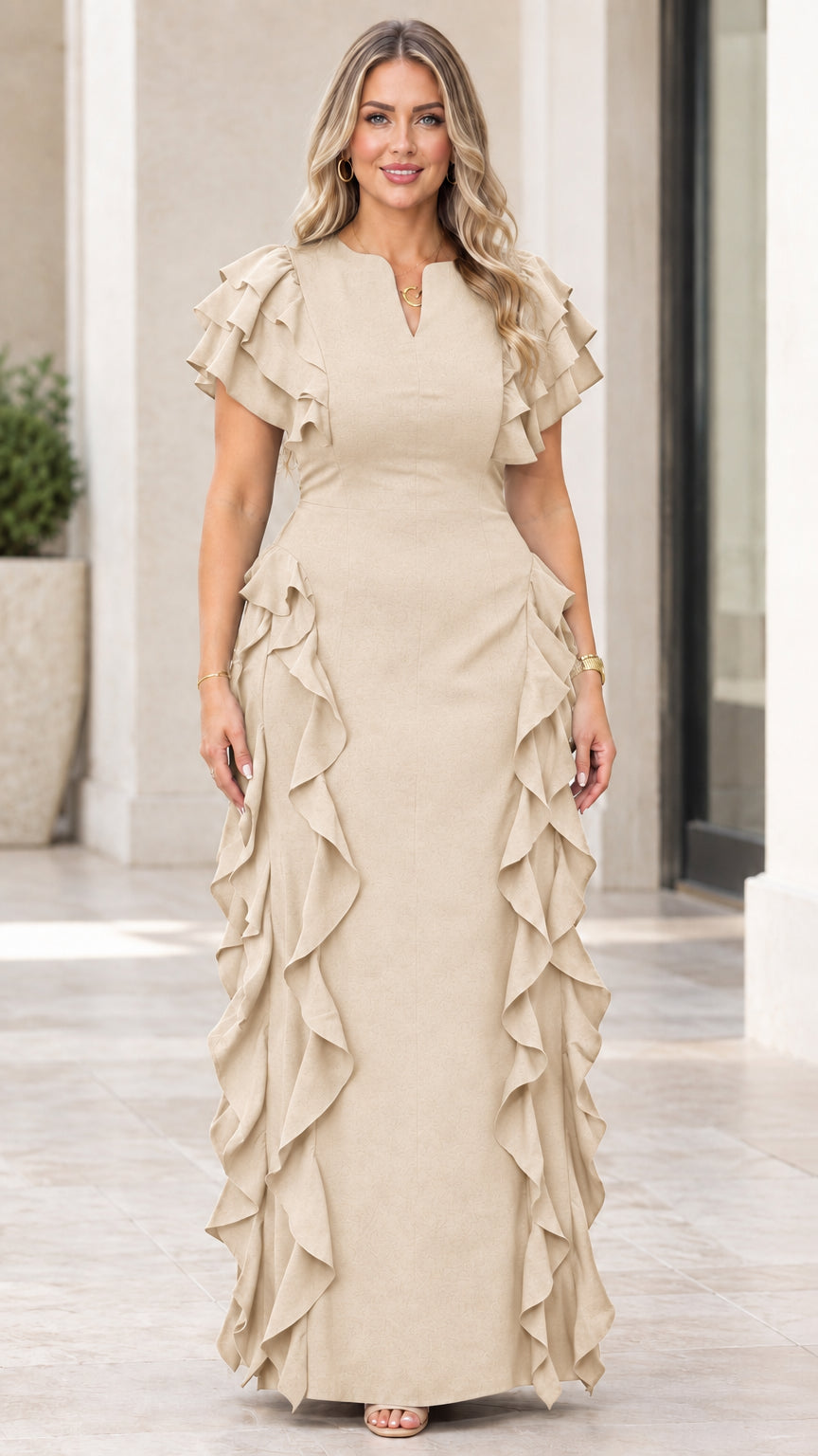 Front view of model wearing beige champagne ruffle flutter sleeve maxi dress