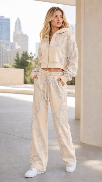 Front view of woman wearing Cream beige rhinestone cropped hoodie and wide-leg sweatpants set