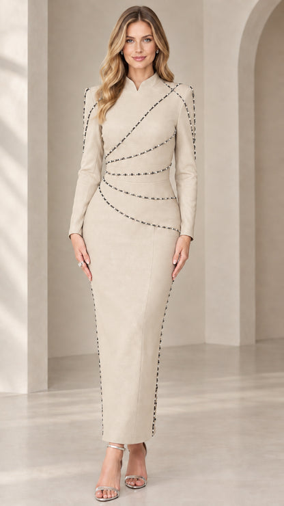Front view of model wearing champagne beige long sleeve beaded column maxi dress